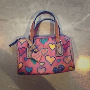 Pink Dooney & Bourke bag with hearts